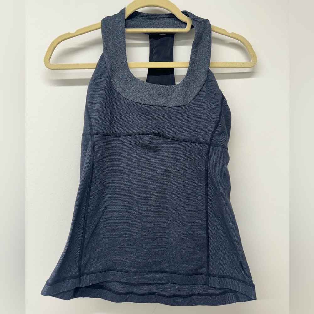 Lululemon yoga top, size small/4 with tag removed. Slightly worn.